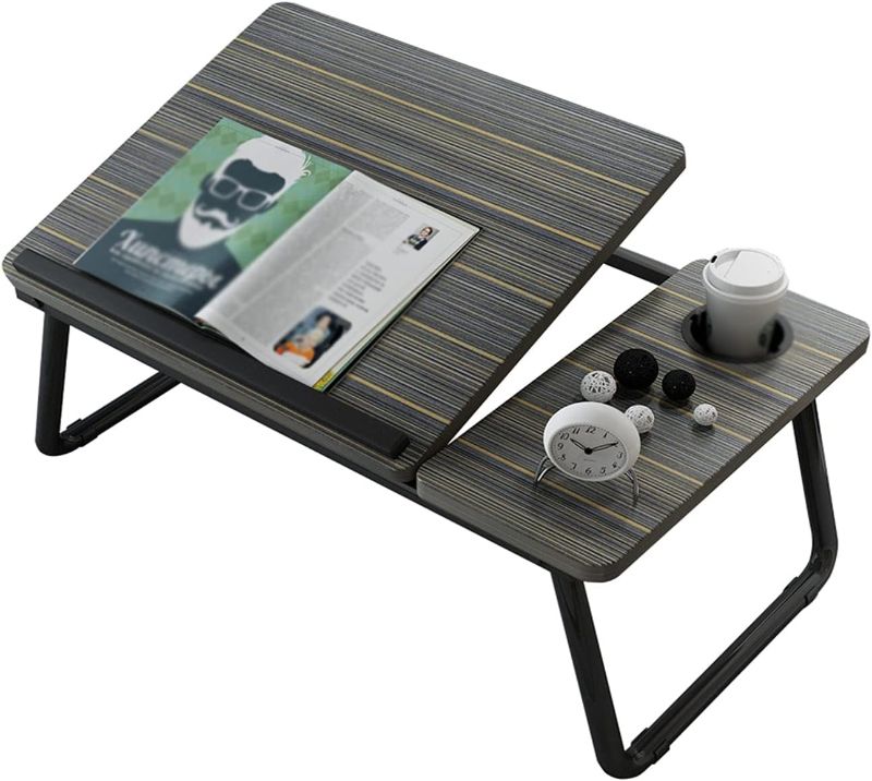 Photo 1 of The Computer Table Laptop Desk Lap Desk with Cup Holder The Angle of The Desk is Adjustable Used for Reading and Game Work of Students
