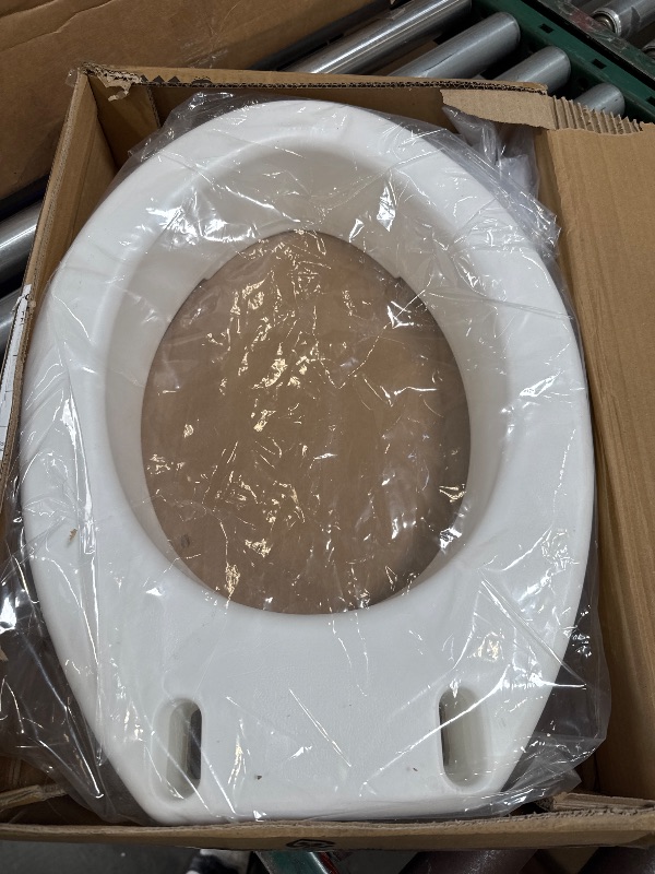 Photo 1 of Carex Toilet Seat Riser, Elongated Raised Toilet Seat Adds 3.5 inches to Toilet Height, for Assistance Bending or Sitting, 300 Pound Weight Capacity Toilet Riser