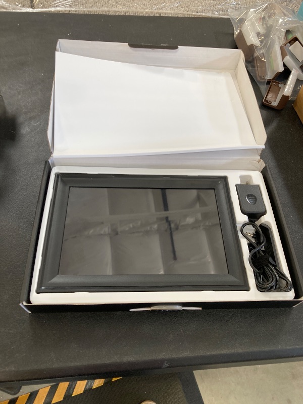 Photo 1 of Digital Picture Frame, 10.1 Inch WiFi Photo Frame Electronic, IPS HD Display Touch Screen,16GB Storage, Wall Mountable, Auto-Rotate, Share Photos and Video via Uhale App