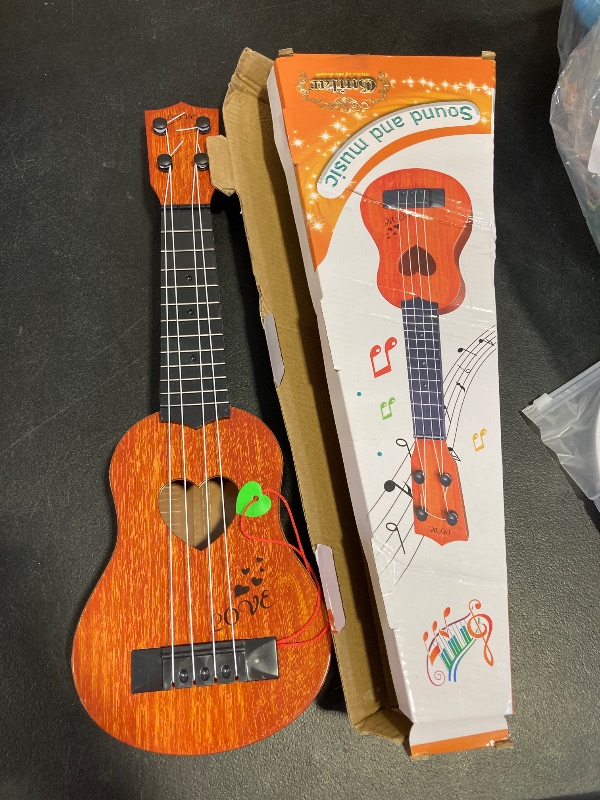 Photo 1 of YEZI Kids Toy Classical Ukulele Guitar Musical Instrument, Brown