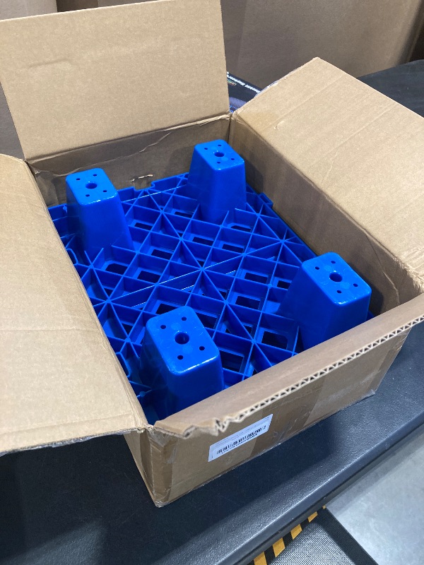 Photo 1 of Plastic Pallets,4 Pack Lightweight Pallet,Nestable Moisture-Proof Floor Pallets,Spliceable Breathable Grid Platform for Garage Warehouse Supermarket Basement Outside Storage,15.7x11.8x3.9in
