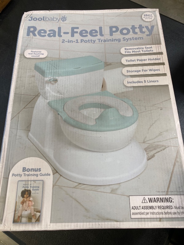Photo 1 of Real Feel 2-in-1 Potty with Wipes Storage, Flushing Sounds & Disposable Liners - Realistic Toilet - Easy to Clean & Assemble - Jool Baby (Aqua)
