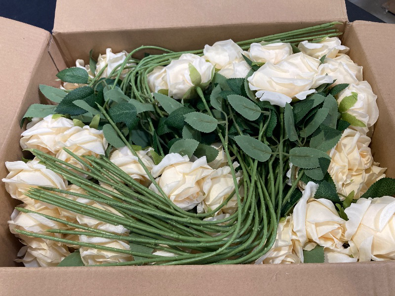 Photo 1 of Jexine 100 Pieces Artificial Roses Flowers Bulk, Long Stem Realistic Fake Silk Roses Bouquet for Table Centerpiece Vases Wedding Party Kitchen Decor (Champagne)