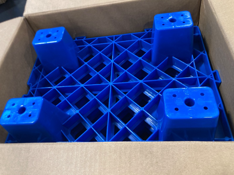 Photo 1 of Plastic Pallets,4 Pack Lightweight Pallet,Nestable Moisture-Proof Floor Pallets,Spliceable Breathable Grid Platform for Garage Warehouse Supermarket Basement Outside Storage,15.7x11.8x3.9in