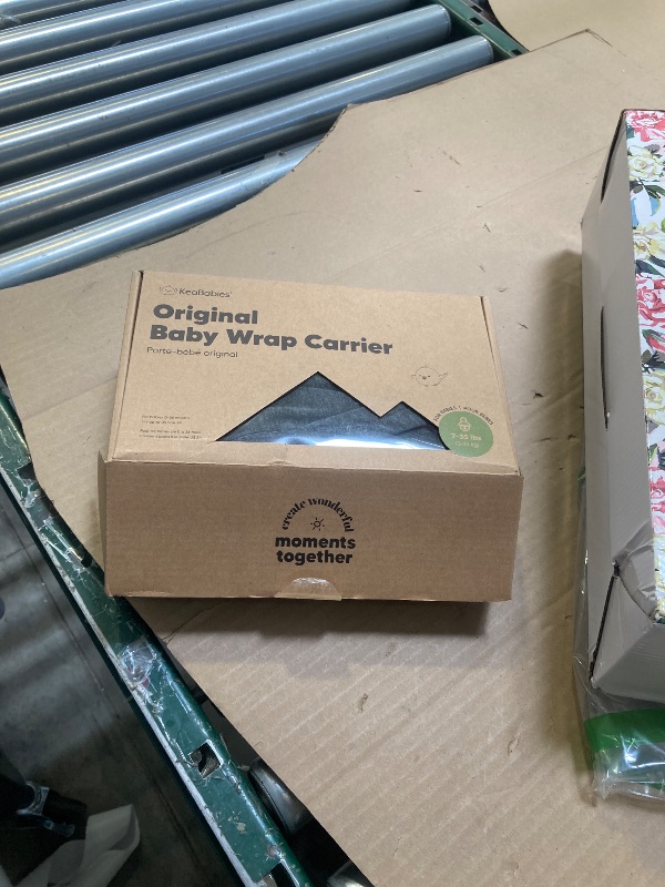 Photo 1 of KeaBabies Baby Wrap Carrier - All in 1 Original Baby Carrier Newborn to Toddler Sling, Easy to Wear, Hands Free Bonding, Lightweight, Breathable Infant Wraps (Mystic Gray)