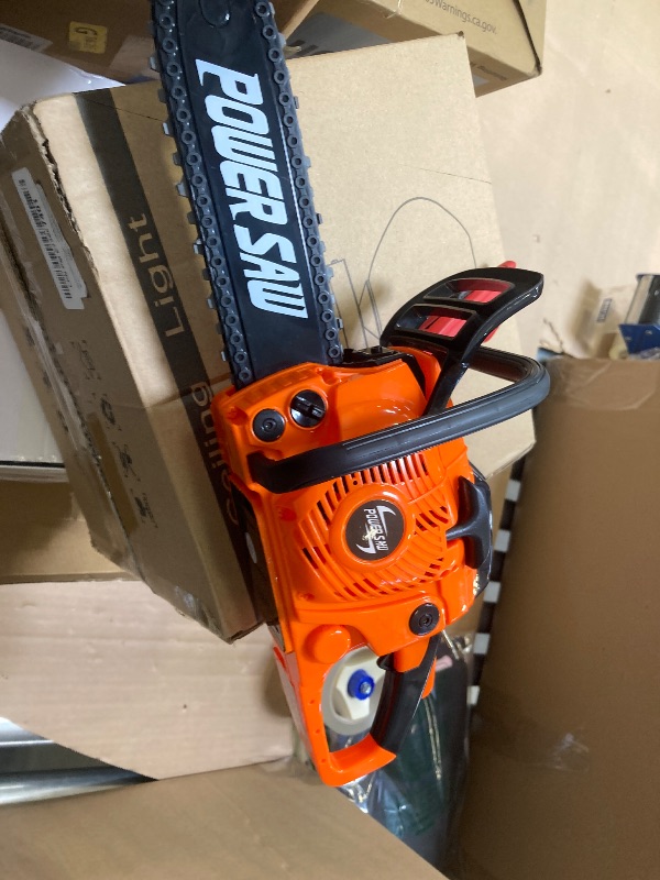 Photo 1 of Hey!Play! Toy Chainsaw for Boys and Girls- Outdoor Power Tool for Pretend Play-Battery Powered with Pull Cord, Rotating Chain and Realistic Sounds, Orange