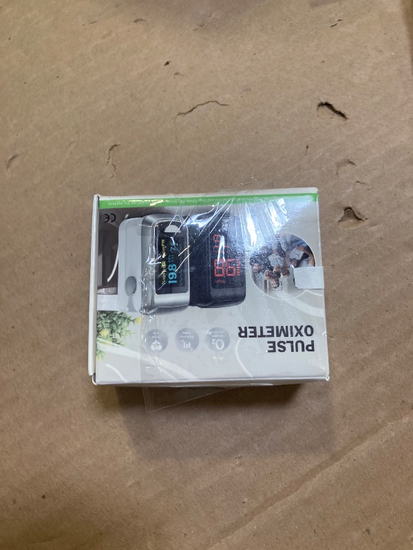 Photo 1 of Fingertip Pulse Oximeter Blood Oxygen Monitor Pulse Ox, Heart Rate and Fast Spo2 Reading Oxygen Meter with OLED Screen Included Batteries and Lanyard