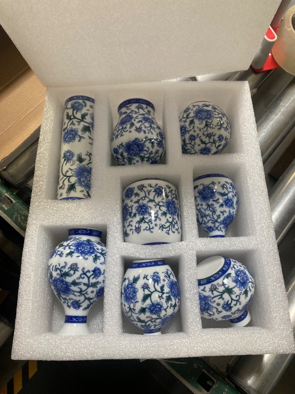 Photo 1 of Dandat 8 Pcs Mini Chinoiserie Bud Vases Ceramic Blue and White Floral Chinese Porcelain Vase Set for Shelf Table Centerpieces Home Decor(Vintage)
