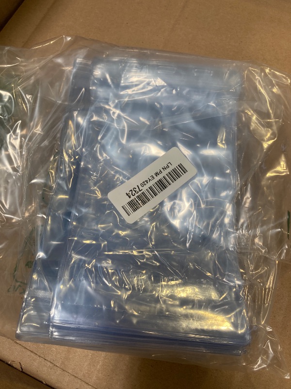 Photo 1 of Patelai 50 Pcs 4 x 8 Inch Plastic Badge Holder Bulk Clear Vinyl ID Protector Sleeves Card Ticket Credential Badge Sleeves Vertical Waterproof Name Tag Holder for Sporting Events