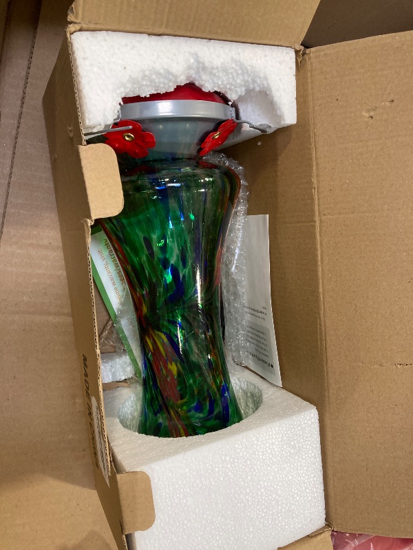 Photo 1 of Glass Hummingbird Feeder for Outdoors: Window Hanging Hummingbirds Gifts for Women - Ant Moat Included, Metal Base with 4 Feeding Ports & Perch, Leak Proof, 38 fl.oz, Best Garden Decor