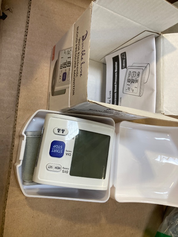 Photo 1 of Wrist Blood Pressure Monitor LCD Display, Adjustable Wrist Blood Pressure Cuff 90x2 Reading Memory Wrist Bp Monitor with Storage Case(White)