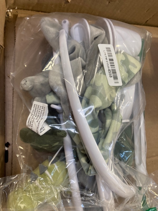 Photo 1 of The Peanutshell Crib Mobile for Boys or Girls - Grey and Green Camo Musical Baby Crib Mobile with 12 Lullabies, Dino Baby Dinosaur Nursery Decor