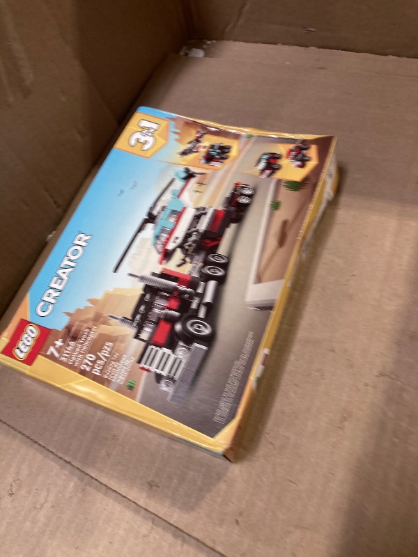 Photo 1 of LEGO Creator 3 in 1 Flatbed Truck with Helicopter Toy, Transforms from Flatbed Truck Toy to Propeller Plane to Hot Rod and SUV Car Toys, Gift Idea for Boys and Girls Ages 7 Years Old and Up, 31146