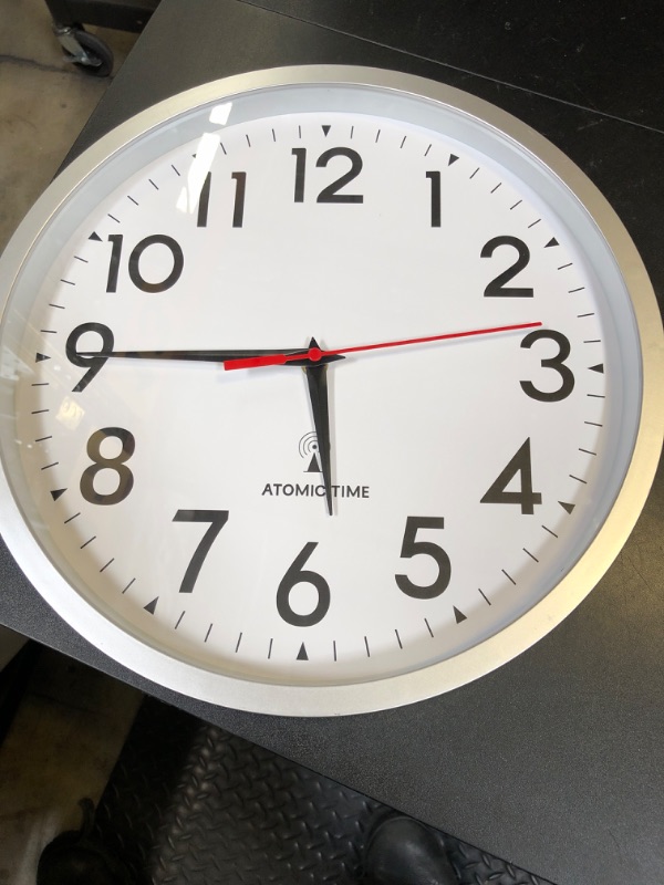 Photo 1 of DAXSMY Atomic Wall Clock Analog 14 Inch Battery Operated Modern Decorative for Living Room Kitchen Office Bedroom Bathroom(Silver)