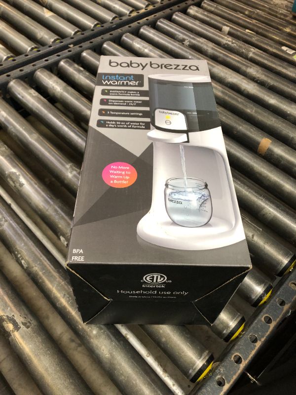 Photo 1 of Baby Brezza Instant Baby Bottle Warmer - Fast Water Warmer Instantly Dispenses 24/7 in 3 Temperatures, White