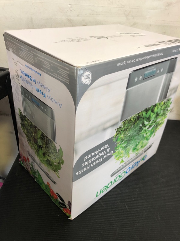Photo 1 of AeroGarden Harvest Elite Indoor Garden Hydroponic System with LED Grow Light and Seed Kit, Holds up to 6 Pods, Stainless Steel