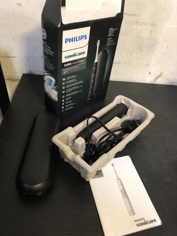Photo 1 of Philips Sonicare ProtectiveClean 5300 Rechargeable Electric Toothbrush, with Pressure Sensor, 3 Cleaning Modes, SmarTimer and QuadPacer, with 2 Bonus Brush Heads, Travel Case, Black, Model HX6423/34