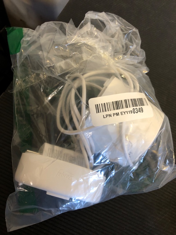 Photo 1 of Febreze Plug Scent Booster Continuous Scent Device Oil Diffuser, Compatible with Febreze Air Freshener Plug in Refills