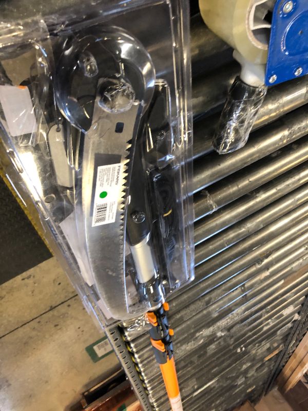 Photo 1 of Fiskars 7-16 ft. Extendable 2-in-1 Pruner and Pole Saw For Tree Trimming, Tree Trimmer with Chain-Drive for Cutting Branches up to 1.25" Diameter with More Power, Garden Tools