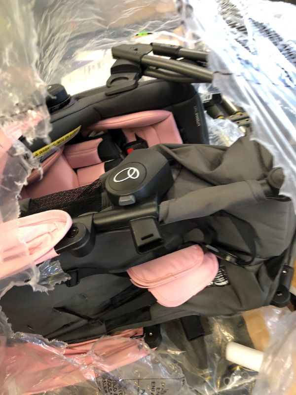 Photo 1 of Evenflo Shyft Intuiti Travel System with Revolve180 LiteMax NXT Rotational Infant Car Seat (Amaranth Pink)