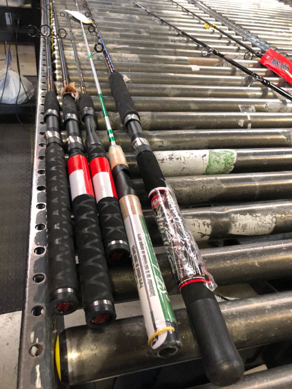 Photo 1 of Five piece fishing rod bundle, rods only. various states of use/damage. sold as is.