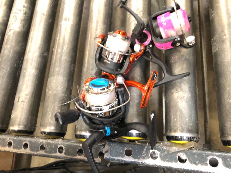 Photo 1 of Three piece fishing reels, various brands, varying levels of use/damage/missing parts.
