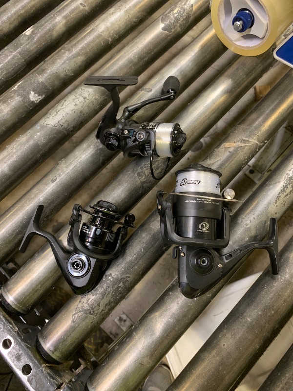 Photo 1 of Three piece fishing reels, various brands, varying levels of use/damage/missing parts.