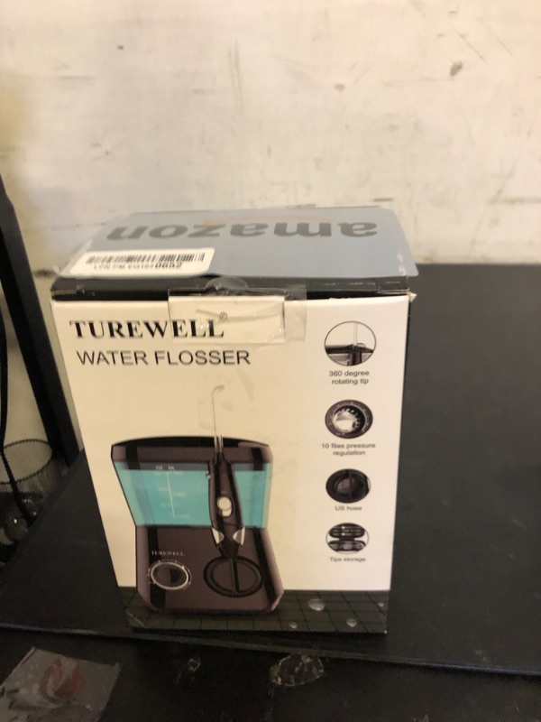 Photo 1 of TUREWELL Water Flossing Oral Irrigator, 600ML Dental Teeth Cleaner 10 Adjustable Pressure, Electric Oral Flosser for Braces, 8 Replacement Jet Tips for Family (Black)