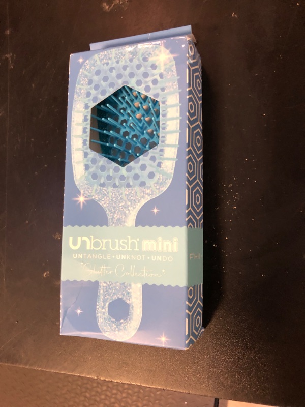 Photo 1 of FHI Heat UNbrush Mini Detangler Brush for Pain-Free Brushing on All Wet or Dry Hair Types — Durable Duoflex Anti-Static Bristles, Lightweight Handle, Vented Mini Hair Brush, Sapphire Blue
