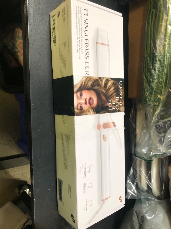 Photo 1 of T3 SinglePass Curl X Extra-Long Barrel Curling Iron with 9 Heat Settings and Ceramic Barrel for Fast Styling and Lasting Results on All Hair Types