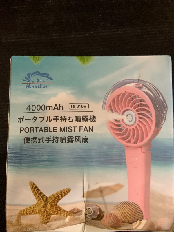 Photo 1 of HandFan 4000mAh Handheld Misting Fan, 50ml Water Tank, Rechargeable Personal Mister Fan Portable AC, Spray Water Mist Fans, Foldable Cooling Ice Fans for Beach Travel Outdoors(Pink)