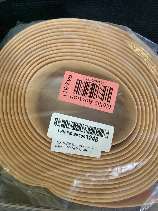 Photo 1 of Floor Transition Strip 2" Self Adhesive Flat Vinyl Flooring Transitions Strip with Strong Backing (5cm, 20FT, Maple Wood Grain)