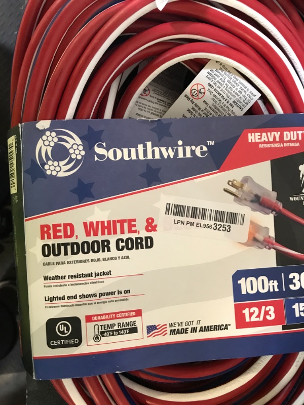 Photo 1 of Southwire Heavy Duty Extension Cord, 100Ft, 12 Gauge, 3 Conductor, Water Resistant Flexible Jacket, SJTW, Red/White/Blue, 2549SWUSA1