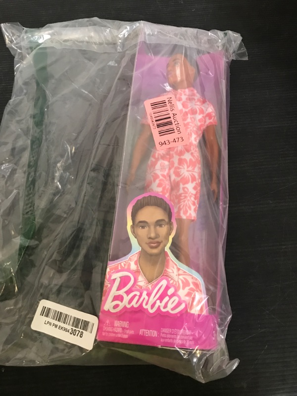 Photo 1 of Barbie Fashionistas Ken Doll #235 with Braided Brown Hair, Wearing Coral Jumpsuit with Hawaiian Print and Green Sandals