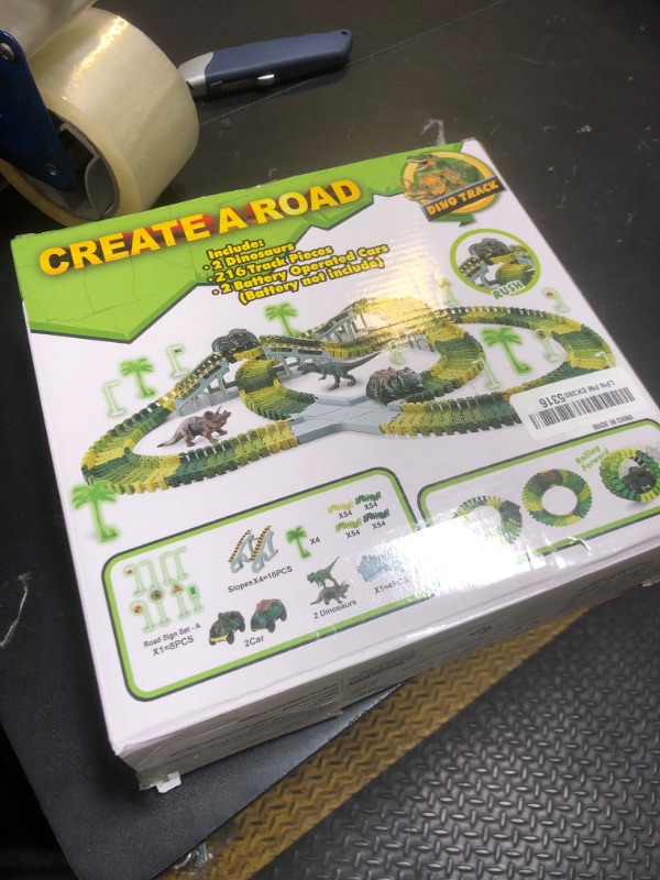 Photo 1 of Dinosaur Toys, 252 PCS Create A Dinosaur World Road Race Tracks, Flexible Track Playset, 2pcs Dinosaur Car for 3 4 5 6 Year Old Boys Girls Birthday Party Favor Gift