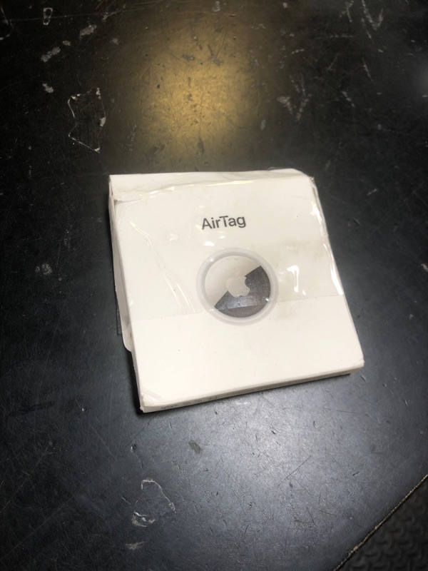 Photo 1 of Apple AirTag. Keep Track of and find Your Keys, Wallet, Luggage, Backpack, and More. Simple one-tap Set up with iPhone or iPad