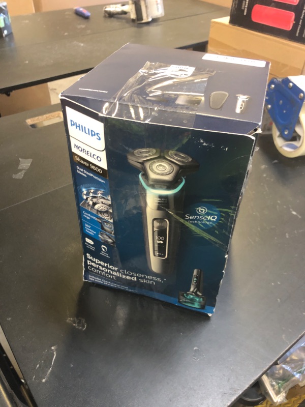Photo 1 of Philips Norelco Shaver Series 9000, Wet and Dry Electric Shaver, with Lift & Cut Shaving System and SenseIQ Technology, Pop-up Trimmer, Cleaning Pod, Charging Stand and Travel Case, Model S9987/85