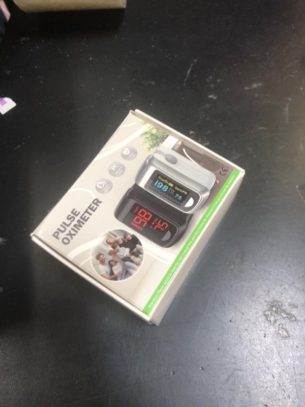 Photo 1 of Fingertip Pulse Oximeter Blood Oxygen Monitor Pulse Ox, Heart Rate and Fast Spo2 Reading Oxygen Meter with OLED Screen Included Batteries and Lanyard