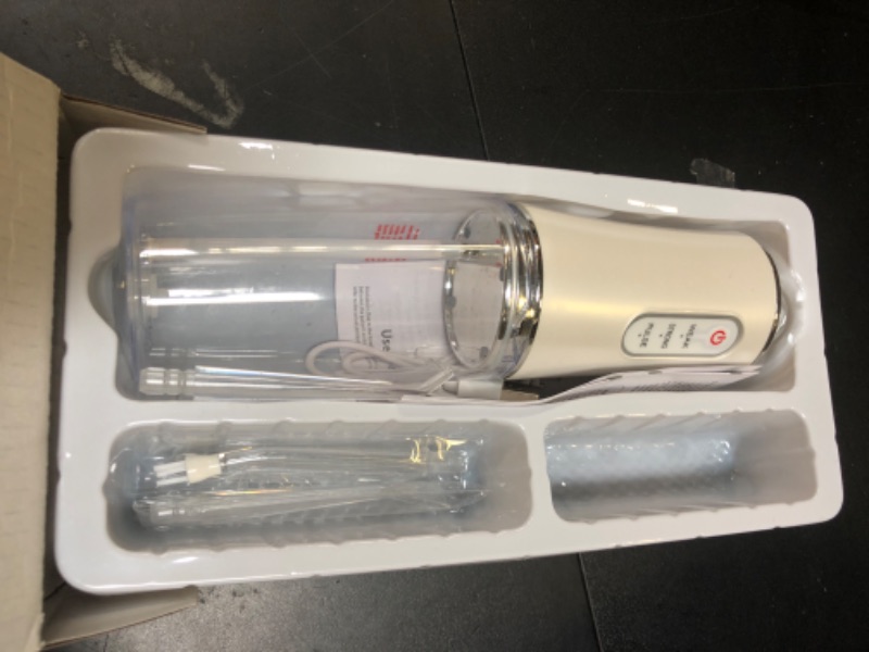 Photo 1 of White Oral Irrigator Missing Pcs**