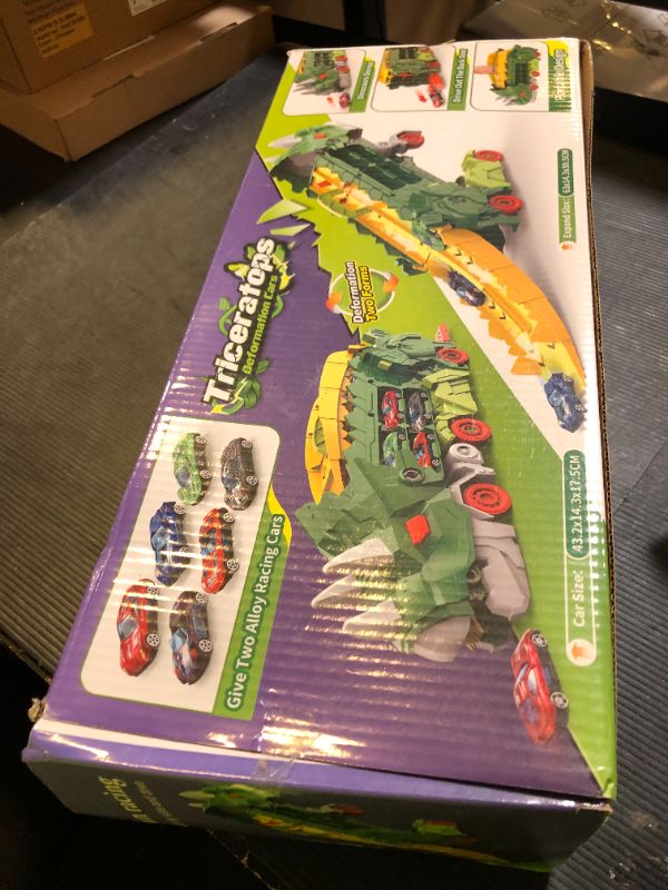Photo 1 of Intoypad Dinosaur Truck Toys for Kids, Transforms into Triceratops with Race Track Set, Ultimate City Dinosaur Transporter Hauler with 4 Cars, Birthday Gifts Toys for Boys 3 4 5 6 7 8 Years Old Blue