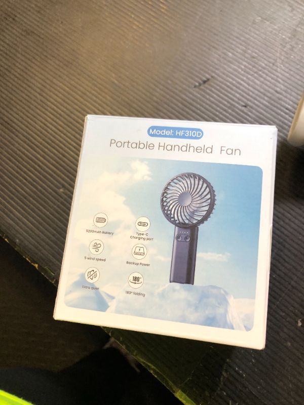 Photo 1 of HandFan 5200mAh Portable Handheld Fan, Rechargeable Hand Fan, Battery Operated 8.5-27hrs, Personal USB Foldable Fan, Travel Essential Gifts for Women/Girls/Friends (White)