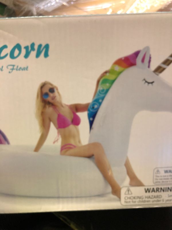 Photo 1 of Jasonwell Giant Inflatable Unicorn Pool Float Floatie Ride On with Fast Valves Large Rideable Blow Up Summer Beach Swimming Pool Party Lounge Raft Decorations Toys for Kids Adults