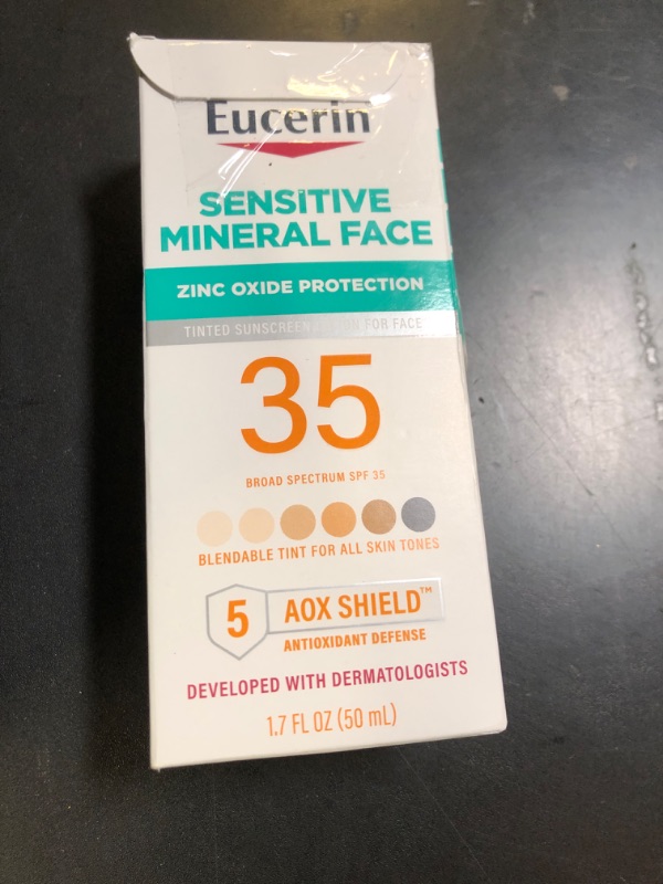 Photo 1 of Eucerin Sun Tinted Sensitive Mineral Face Sunscreen Lotion SPF 35, Non-Comedogenic Mineral Sunscreen with Gentle Zinc Oxide Protection for Sensitive Skin, 1.7 Fl Oz Bottle