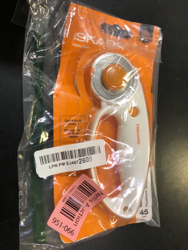 Photo 1 of Fiskars 45mm Rotary Cutter for Fabric with Ergonomic Loop Grip, Premium Steel Rotary Fabric Cutter Blade for Precise Cuts, Arts and Crafts, Sewing Supplies and Quilting Tools