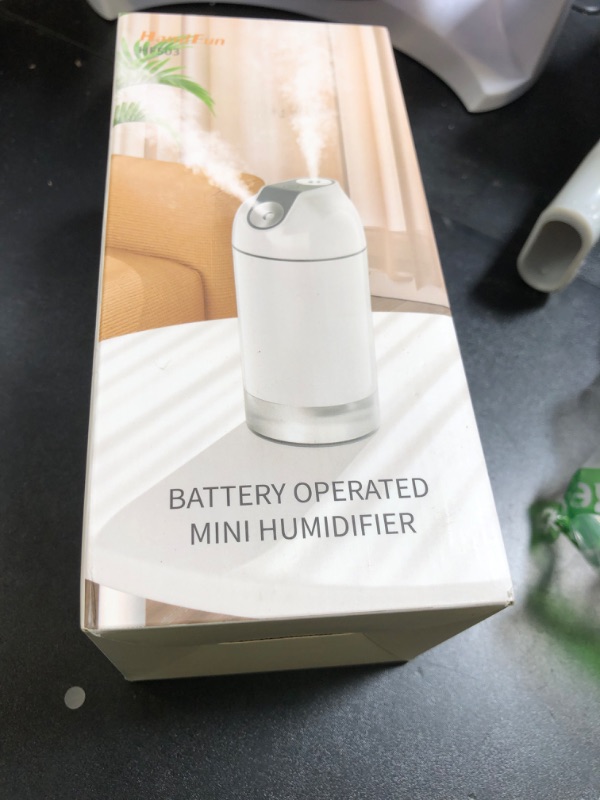 Photo 1 of HandFun Mini Humidifier-Battery Operated 480ml Cordless Portable Small Humidifier USB Rechargeable Personal Desktop Humidifiers With Night Light & 4 Spray Modes for Car, Baby, Plants (White, 2600mAh)