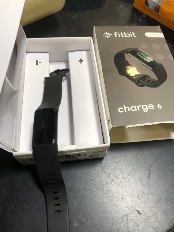 Photo 1 of Fitbit Charge 6 Fitness Tracker with Google apps, Heart Rate on Exercise Equipment, 6-Months Premium Membership Included, GPS, Health Tools and More, Obsidian/Black, One Size (S & L Bands Included)