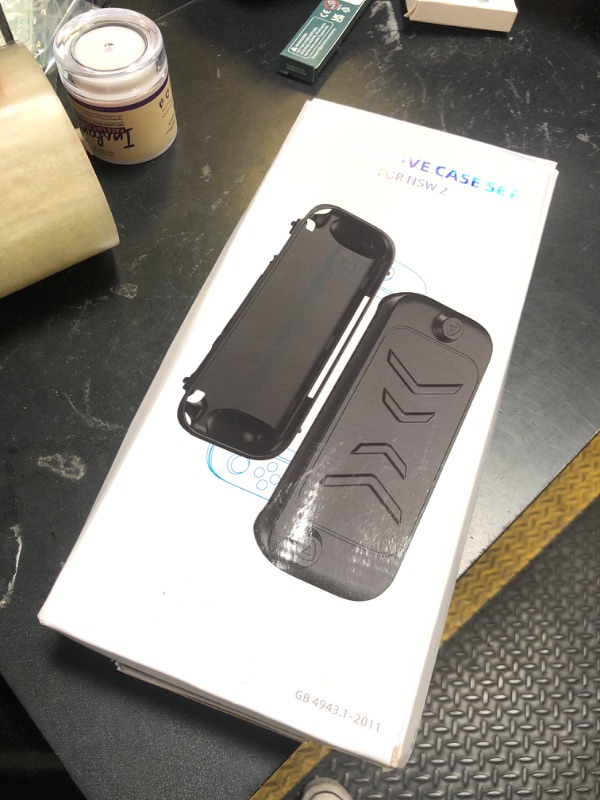 Photo 1 of Grip Case for Nintendo Switch 2 (2025), Protective Case with Ergonomic Grip, Include Detachable Front Shell Face Cover, Bracket and Strap
