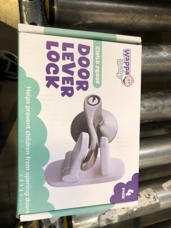 Photo 1 of Door Lever Locks (4 Pack) - Prevents Toddlers from Opening Doors - Durable ABS with 3M Adhesive - Easy One-Hand Operation for Adults, No Tools Needed