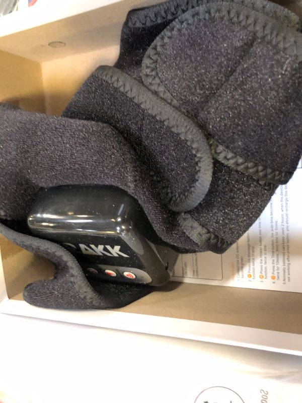 Photo 1 of TRAKK Heating Massaging Knee & Elbow Brace and Wrap- Rechargeable Multiple Mode Pain Relief