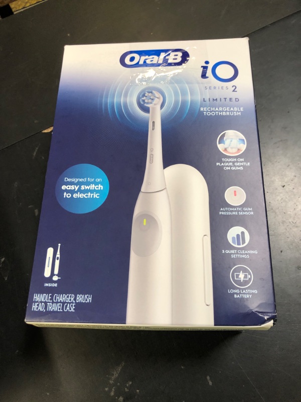 Photo 1 of Oral-B iO Simple Clean Rechargeable Electric Powered Toothbrush, Pure White with 1 Gentle Care Brush Head and 1 White Travel Case - Automatic Pressure Sensor to Protect Gums - 3 Modes -2 Min Timer